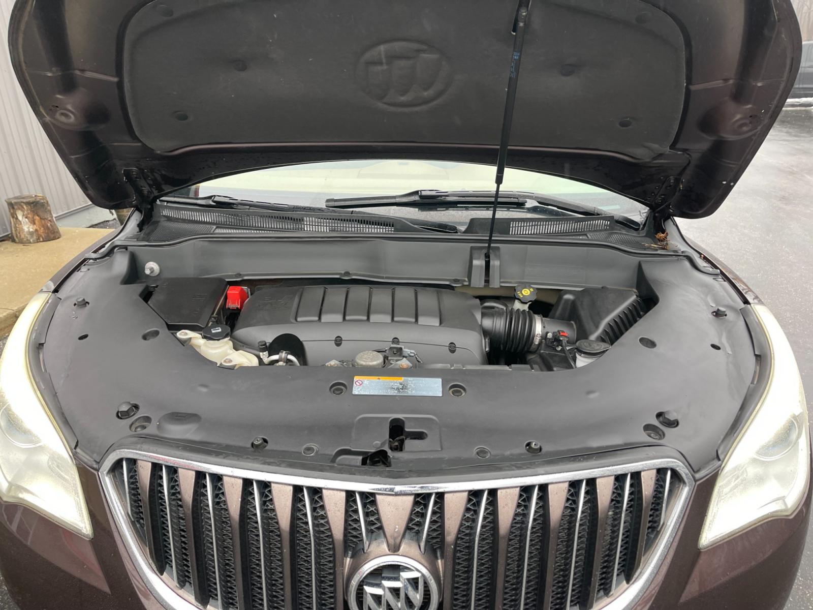 2016 Brown /Brown Buick Enclave Premium AWD (5GAKVCKD4GJ) with an 3.6L V6 DOHC 24V engine, 6A transmission, located at 547 E. Main St., Orwell, OH, 44076, (440) 437-5893, 41.535435, -80.847855 - This 2016 Buick Enclave Premium AWD boasts a luxurious range of features including single-owner status, climate-controlled leather seats, adaptive HID headlights for improved visibility, and safety features like blind spot monitoring and rear cross-traffic alert. Its towing capability is notable at - Photo #16